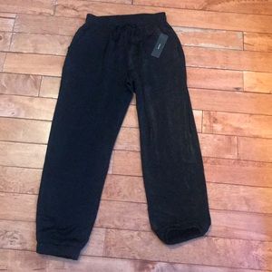 Lulu’s Black silk joggers.